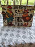 An Old Rooster & A Cute Chick Live Here metal sign