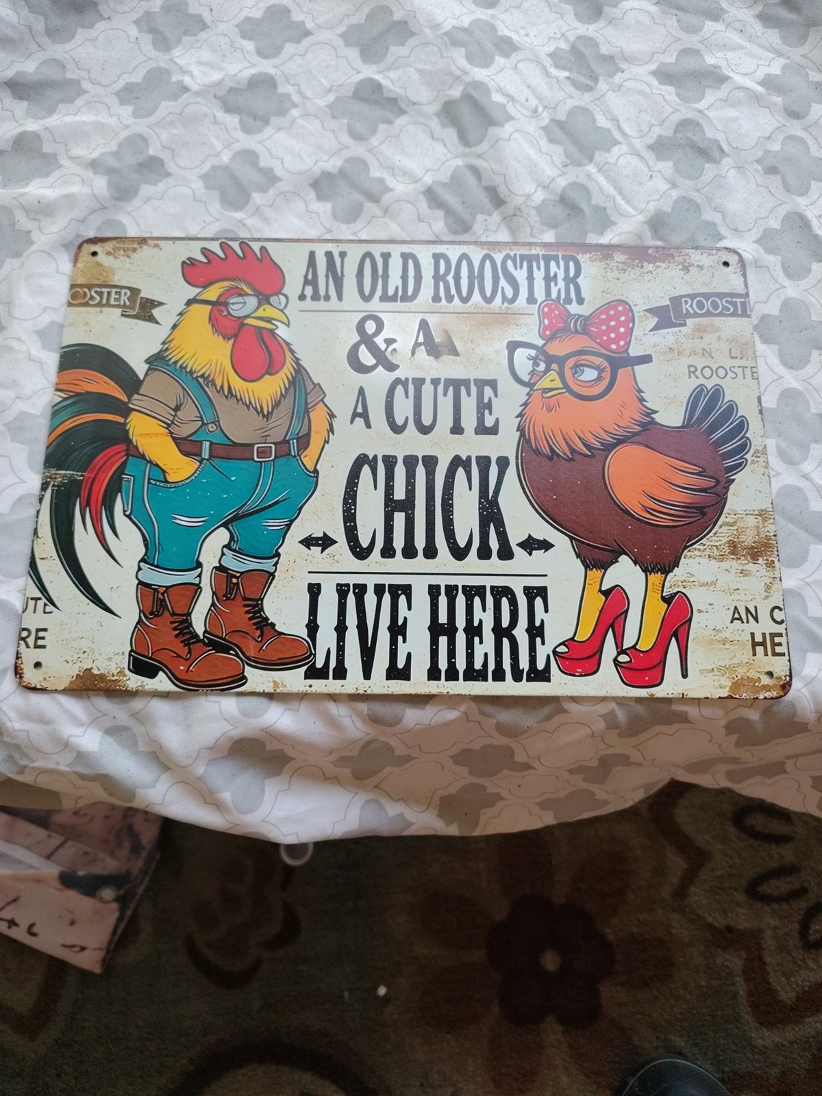 An Old Rooster & A Cute Chick Live Here metal sign