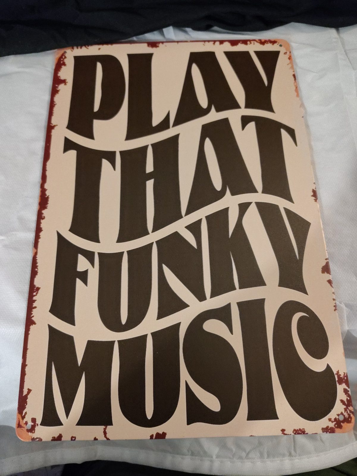 Play That Funky Music metal sign