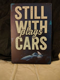 Still Plays With Cars metal sign