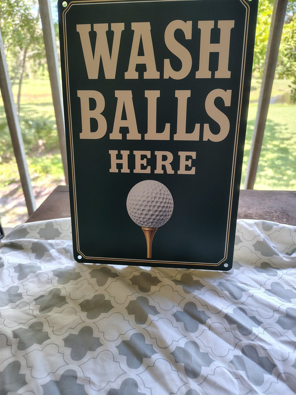 Wash Balls Here metal sign
