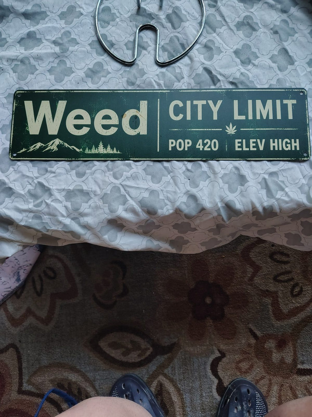Weed City Limit metal sign