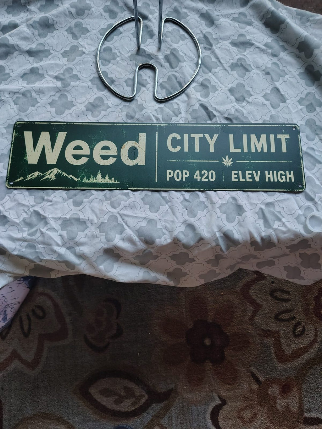 Weed City Limit metal sign