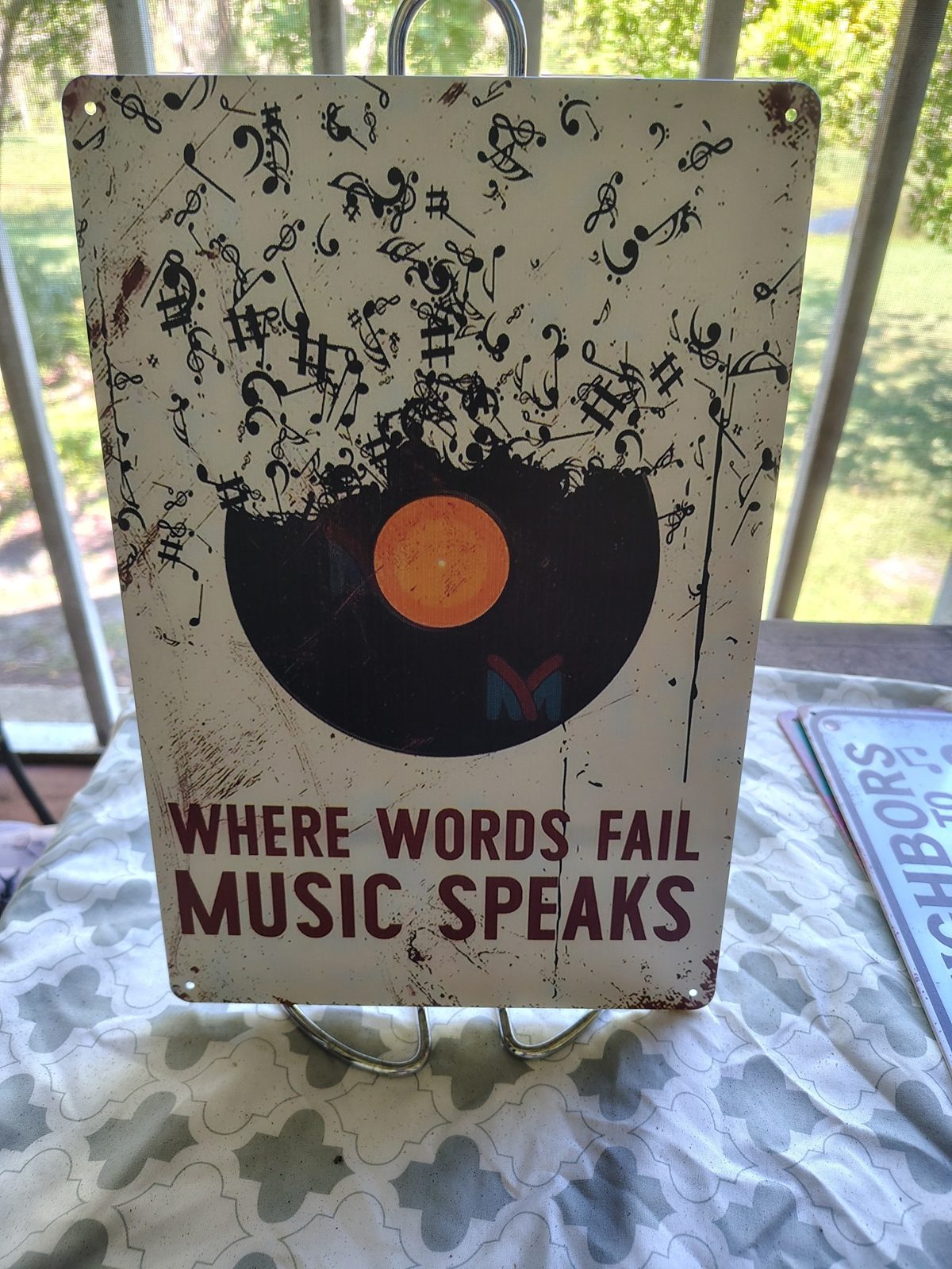 Where Words Fail, Music Speaks metal sign