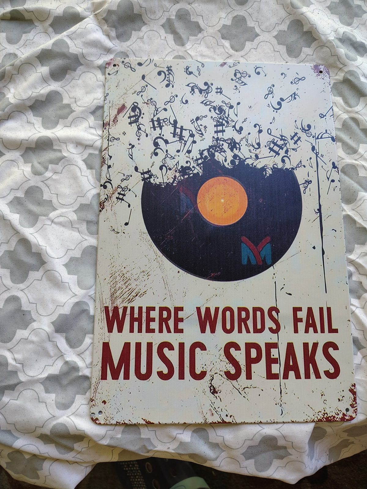 Where Words Fail, Music Speaks metal sign