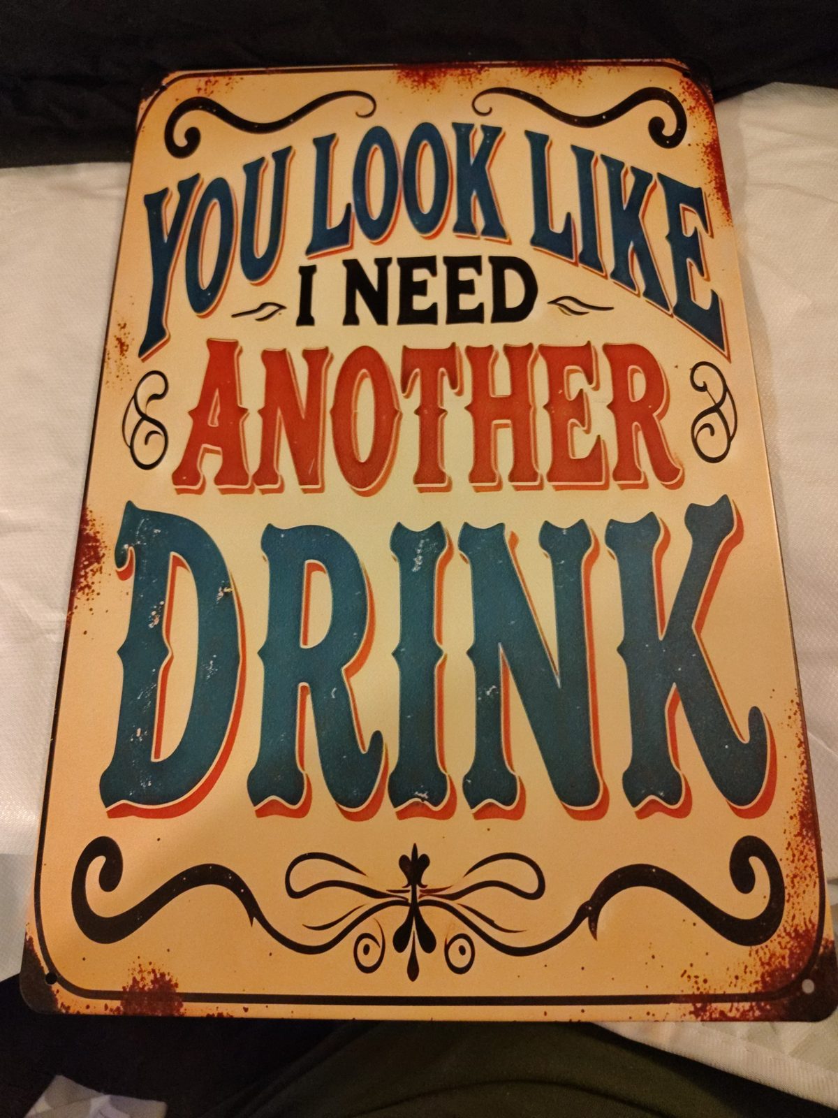 You Look Like I Need Another Drink metal sign